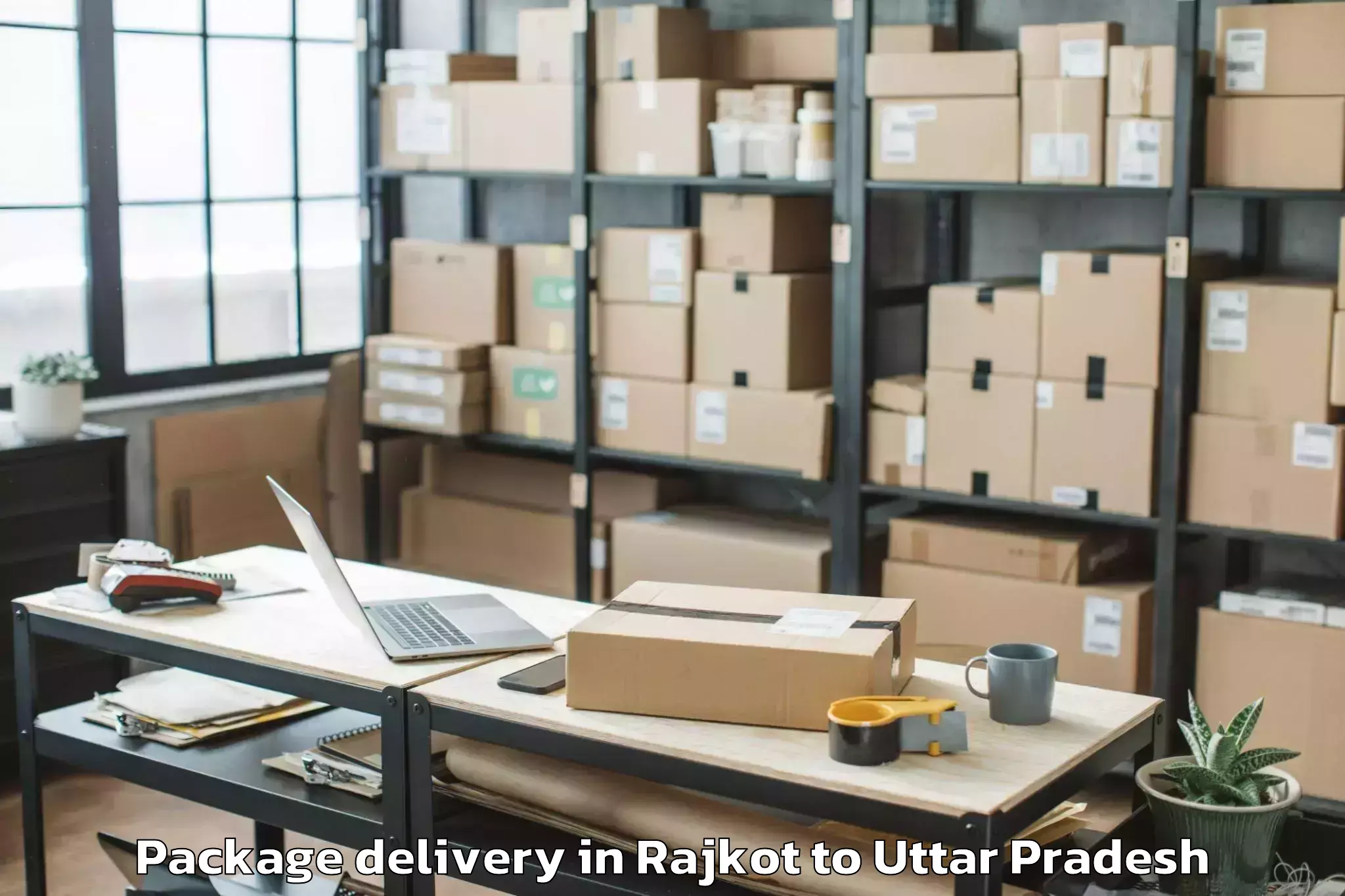 Quality Rajkot to Jananayak Chandrashekhar Unive Package Delivery